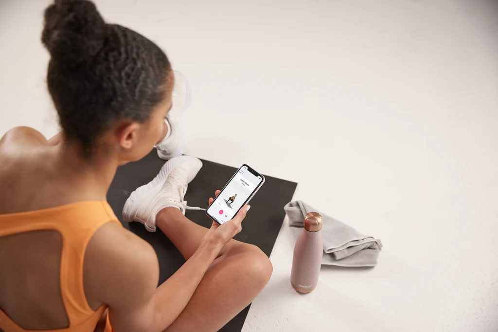 Britany Williams using the Sweat App