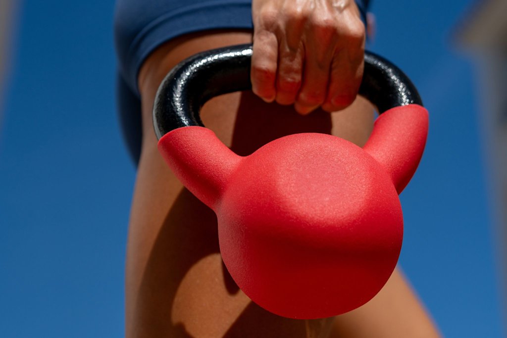 Woman holding kettlebell