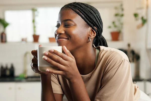 Woman holding mug