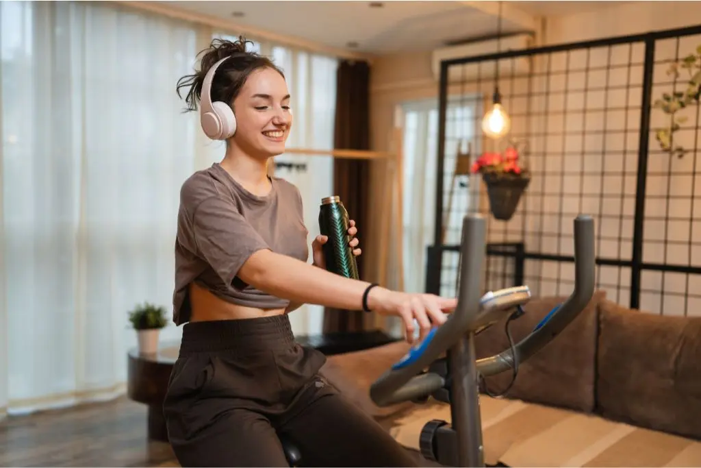 Woman On Exercise Bike